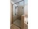 Modern bathroom with a glass enclosed shower and corner soaking tub featuring tiled surround at 3030 Collin House Dr, Fort Mill, SC 29715