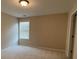 Cozy bedroom featuring neutral paint, carpeted flooring and a window providing natural light at 3030 Collin House Dr, Fort Mill, SC 29715