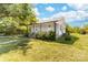 Charming single story home featuring a cozy front porch and manicured lawn at 3117 Fraley Church Rd, Gastonia, NC 28054