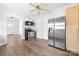Open concept kitchen with stainless steel appliances and a view to the living room at 3117 Fraley Church Rd, Gastonia, NC 28054