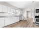 Modern kitchen with stainless steel appliances and a view to the living room at 3117 Fraley Church Rd, Gastonia, NC 28054