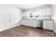 Modern kitchen with white cabinets, new countertops, and stainless steel appliances at 3117 Fraley Church Rd, Gastonia, NC 28054