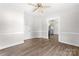 Bright living room featuring an open floor plan leading to the kitchen at 3117 Fraley Church Rd, Gastonia, NC 28054