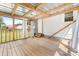 Screened porch with wood floor, metal roof, and access to the backyard at 3117 Fraley Church Rd, Gastonia, NC 28054