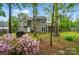 Spacious backyard with lush landscaping, grill, and a well-maintained lawn at 3908 Brittany Ct, Indian Trail, NC 28079