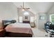 Relaxing bedroom showcases vaulted ceilings, and many sources of light at 3908 Brittany Ct, Indian Trail, NC 28079