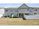 Spacious fenced backyard with a well-maintained lawn, patio, and privacy at 4011 Black Walnut Way, Indian Land, SC 29707