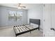 Cozy bedroom with natural light, neutral walls, and carpet floors, offering a peaceful retreat at 4011 Black Walnut Way, Indian Land, SC 29707