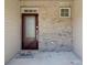 Covered entryway featuring a brick wall, glass-paneled front door, and welcome mat at 4011 Black Walnut Way, Indian Land, SC 29707