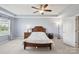 Inviting main bedroom featuring a neutral color palette, soft lighting, and carpet floors at 4011 Black Walnut Way, Indian Land, SC 29707