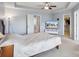 Serene main bedroom with neutral walls, a ceiling fan, and a television, offering a private retreat at 4011 Black Walnut Way, Indian Land, SC 29707