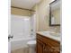 Bathroom featuring a shower and bath combo, vanity with modern fixtures and a decorative mirror at 4193 He Propst Rd, Maiden, NC 28650