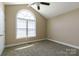 Bedroom with high ceilings and arched window with natural light at 4193 He Propst Rd, Maiden, NC 28650