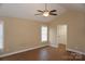 Bedroom featuring a ceiling fan, hardwood floors, a closet, and natural light from the windows at 4193 He Propst Rd, Maiden, NC 28650