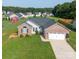 A cozy home with a two-car garage, brick accents, and a well-maintained lawn in a friendly neighborhood at 4193 He Propst Rd, Maiden, NC 28650