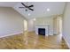 Spacious living area with hardwood floors, a fireplace, ceiling fan, and neutral color scheme at 4193 He Propst Rd, Maiden, NC 28650