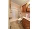 Bathroom featuring a shower, toilet, vanity, and tile flooring at 5364 Millersville Rd, Taylorsville, NC 28681