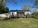Charming single-story home with a front porch and accessible ramp in a quiet neighborhood at 5364 Millersville Rd, Taylorsville, NC 28681