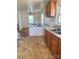 The kitchen has a breakfast bar and linoleum and hardwood flooring at 5364 Millersville Rd, Taylorsville, NC 28681