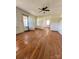 Living room with hardwood flooring, a ceiling fan, and natural light at 5364 Millersville Rd, Taylorsville, NC 28681