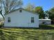 The back of this quaint house has a big yard with some shade at 5364 Millersville Rd, Taylorsville, NC 28681