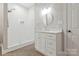 Bathroom featuring a walk-in shower and vanity at 5538 Camelot Dr, Charlotte, NC 28270