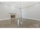Bright living room featuring a modern fireplace at 5538 Camelot Dr, Charlotte, NC 28270