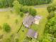 An aerial view of the home and yard with mature landscaping and an outbuilding on a large lot at 5840 Shirley Rd, Fort Lawn, SC 29714