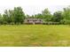 Beautiful home with a spacious front yard, mature trees, and a welcoming front porch at 5840 Shirley Rd, Fort Lawn, SC 29714