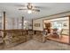 Open-concept living space with a large sectional sofa and view into the adjacent dining area at 5840 Shirley Rd, Fort Lawn, SC 29714
