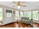 Light-filled living room with hardwood floors, neutral paint, and charming furniture at 5840 Shirley Rd, Fort Lawn, SC 29714