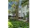 Beautiful townhomes with well-maintained landscaping and inviting entrances at 627 N Alexander St, Charlotte, NC 28202