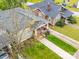 Aerial view of home, featuring charming front porch and well-manicured front yard at 705 N Fulton St, Salisbury, NC 28144