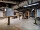 Unfinished basement with exposed beams and ductwork is ready for customization at 705 N Fulton St, Salisbury, NC 28144