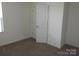 Empty bedroom with carpet flooring, offering a blank canvas for personalization at 719 N Kelly St, Statesville, NC 28677