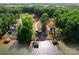 Panoramic aerial view of luxury lakefront homes, each with private docks and serene setting at 8058 Edgewater Dr, Norwood, NC 28128