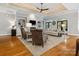 Stylish living room showcasing hardwood floors, a fireplace, and built-in bookshelves for an inviting atmosphere at 894 Stratford Run Dr, Fort Mill, SC 29708
