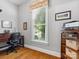 Cozy home office features a large window, a traditional desk, and wooden floors for a great workspace at 894 Stratford Run Dr, Fort Mill, SC 29708