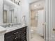 Bathroom featuring a vanity with marble countertop and a shower/tub combination at 9012 Saint Thomas Ln, Charlotte, NC 28277
