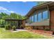 Brick home featuring lots of natural light, beautiful yard and well-manicured landscaping at 916 E Park Dr, Lincolnton, NC 28092