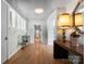 Inviting foyer with hardwood floors, soft colors, and a decorative table at 916 E Park Dr, Lincolnton, NC 28092