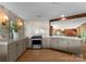 Modern kitchen with marble backsplash and view of formal dining room at 916 E Park Dr, Lincolnton, NC 28092