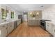 Spacious eat-in kitchen with stainless steel appliances, hardwood floors, and lots of natural light at 916 E Park Dr, Lincolnton, NC 28092