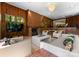 Spacious living room with fireplace, wood paneling and an open floor plan is great for entertaining at 916 E Park Dr, Lincolnton, NC 28092