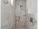 Beautiful walk-in shower with unique marble style tile and updated shower fixtures at 916 E Park Dr, Lincolnton, NC 28092