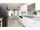 Bright kitchen showcasing white cabinetry and plenty of counter space at 1002 Christobal Ct, Indian Trail, NC 28079