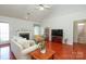Comfortable living room with a fireplace and plenty of natural light at 1002 Christobal Ct, Indian Trail, NC 28079