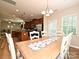 Dining room showcases table seating for six, and an open layout to the kitchen at 1033 Lilly Pond Dr, Fort Mill, SC 29715