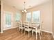 Charming dining room with natural light and view of a glass panel door to outdoor living space at 1033 Lilly Pond Dr, Fort Mill, SC 29715