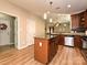 A kitchen island adds prep space to this well-equipped kitchen with stainless steel appliances at 1033 Lilly Pond Dr, Fort Mill, SC 29715